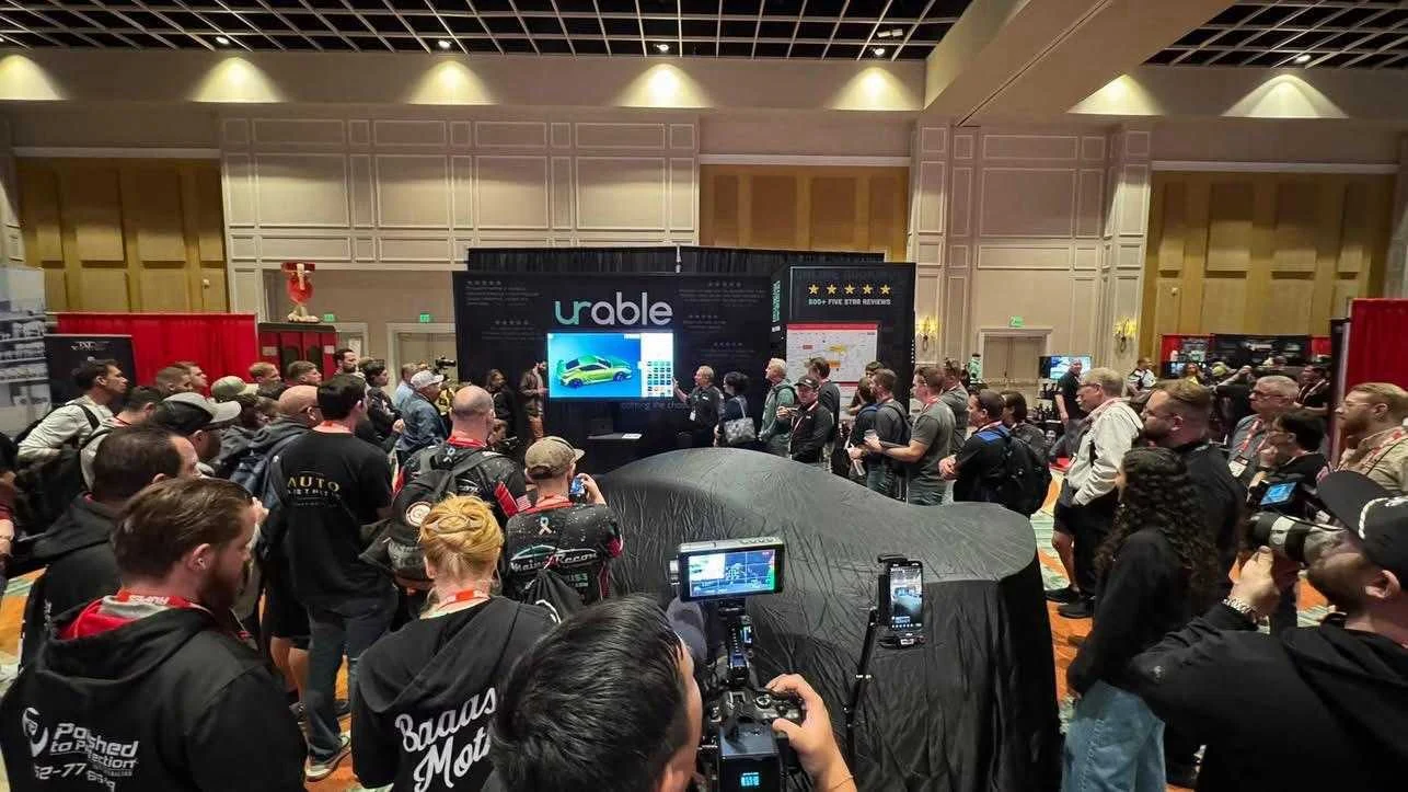 The Urable vehicle covered at the Mobile Tech Expo booth